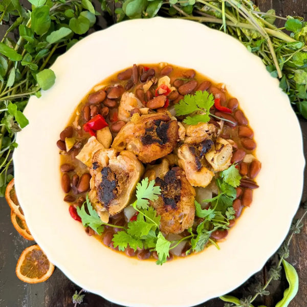 Beef trotters stuffed with liver mousse in a rich bean stew