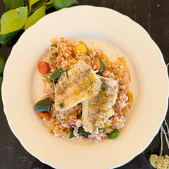 Steamed zander fillets with vegetable rice.
