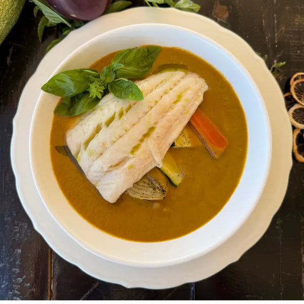 River fish in a mild curry sauce with crayfish