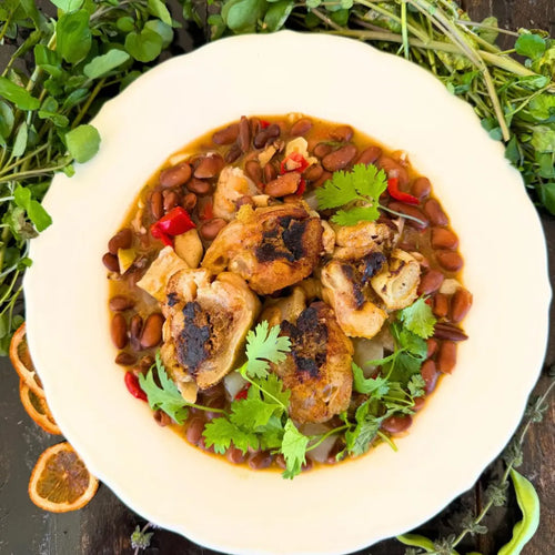 Beef trotters stuffed with liver mousse in a rich bean stew