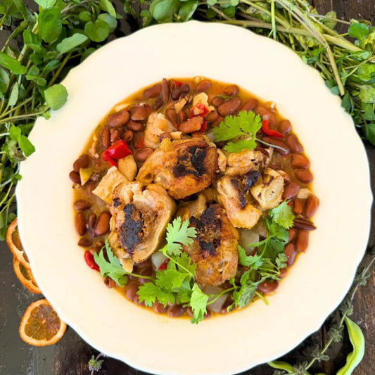Beef trotters stuffed with liver mousse in a rich bean stew