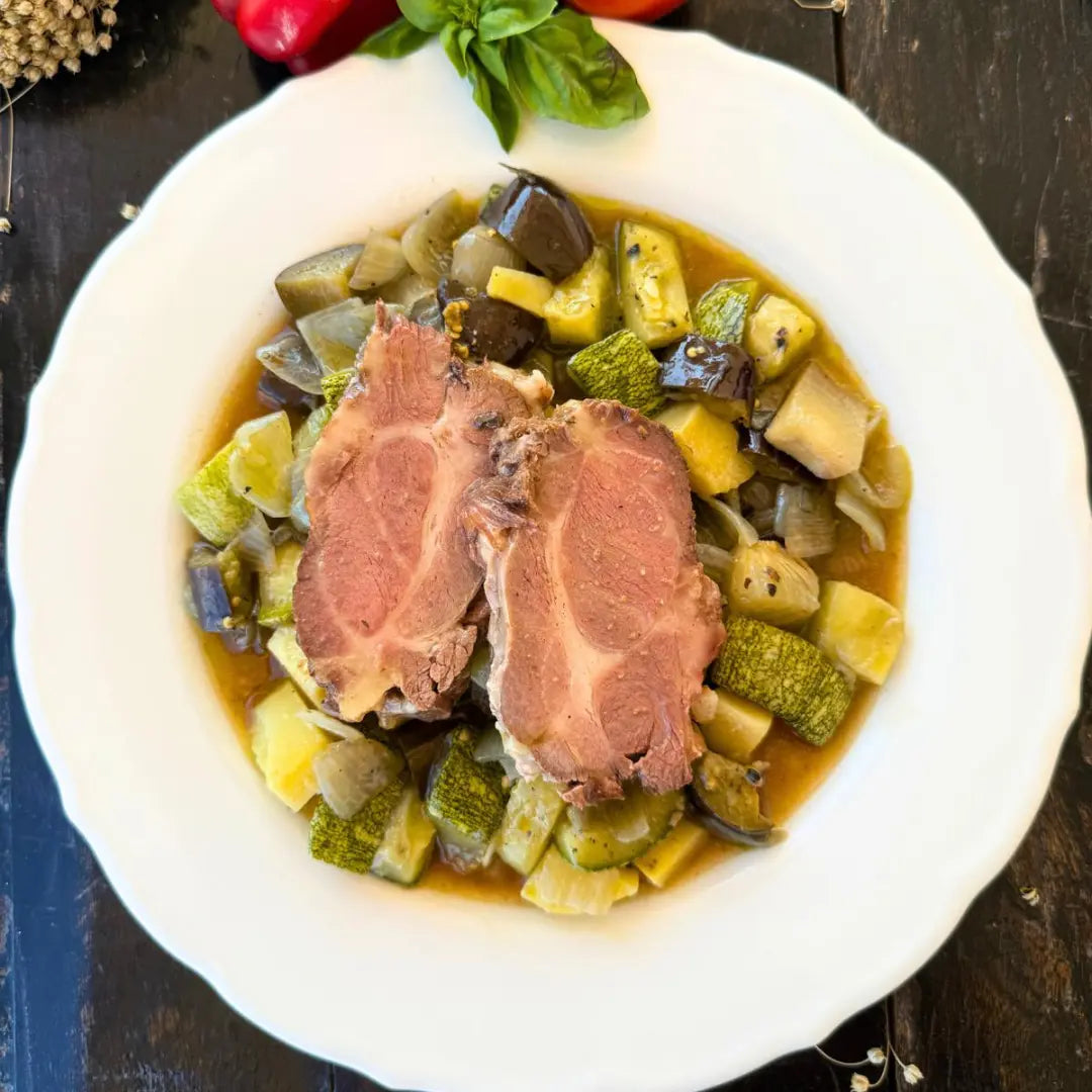 Slow-roasted black pork shoulder with summer vegetable stew