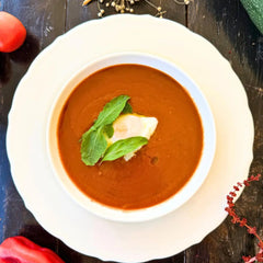 Roasted bell pepper cream with poached egg.