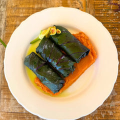Red cabbage and legume bundles with sweet potato puree.