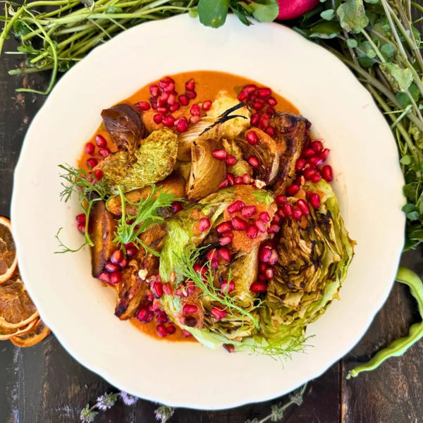 Grilled cabbage heart, roasted veggies, pomegranate sauce